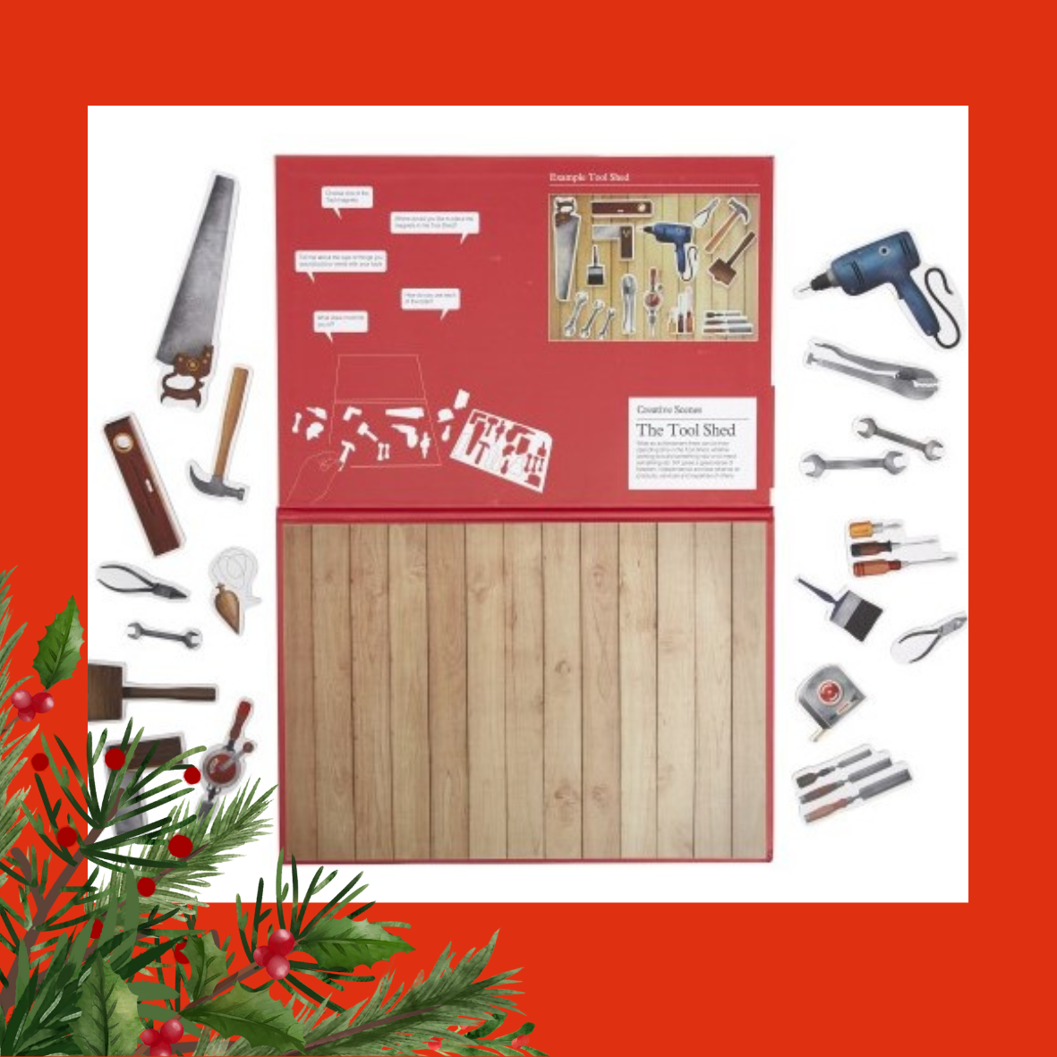 An image of the magnetic picture board, which is a tool shed theme. There are large magnetic images of tools around it which can be placed onto the board. The image is on a red background and there is holly and red berries in the left hand corner of the image. 