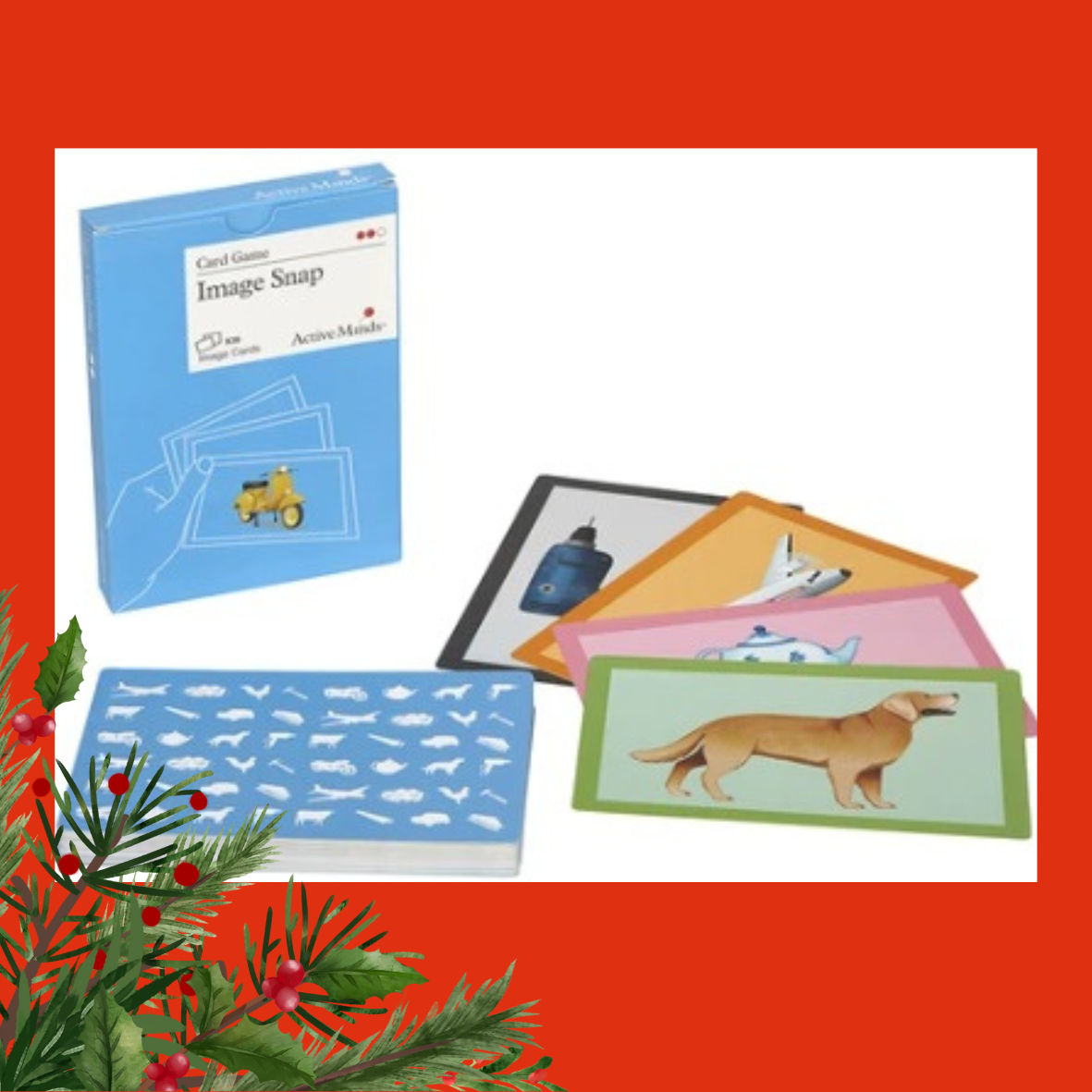 An image of category snap. There are 4 different cards on show, all brightly coloured. One is of a dog, another is a teapot, one is a plane and the last one is a drill. They are on a red background and there is holly and red berries in the left corner of the image.