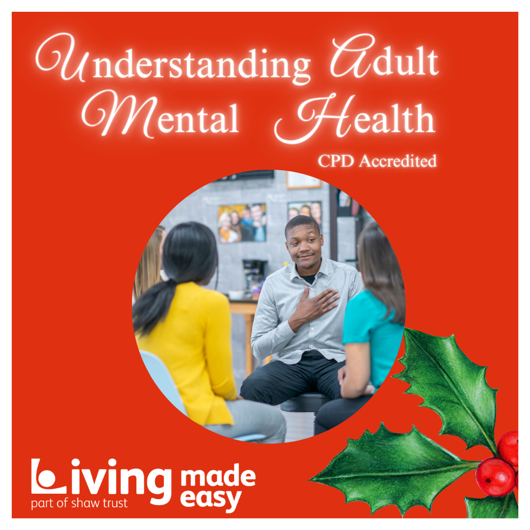 Door number 12 reveals the words Understanding Adult Mental Health. There is an image of a man wearing a grey shirt, sat down talking to a group of other people, with his hand on his chest. The image is on a red background and there is holly and berries in the bottom right corner.