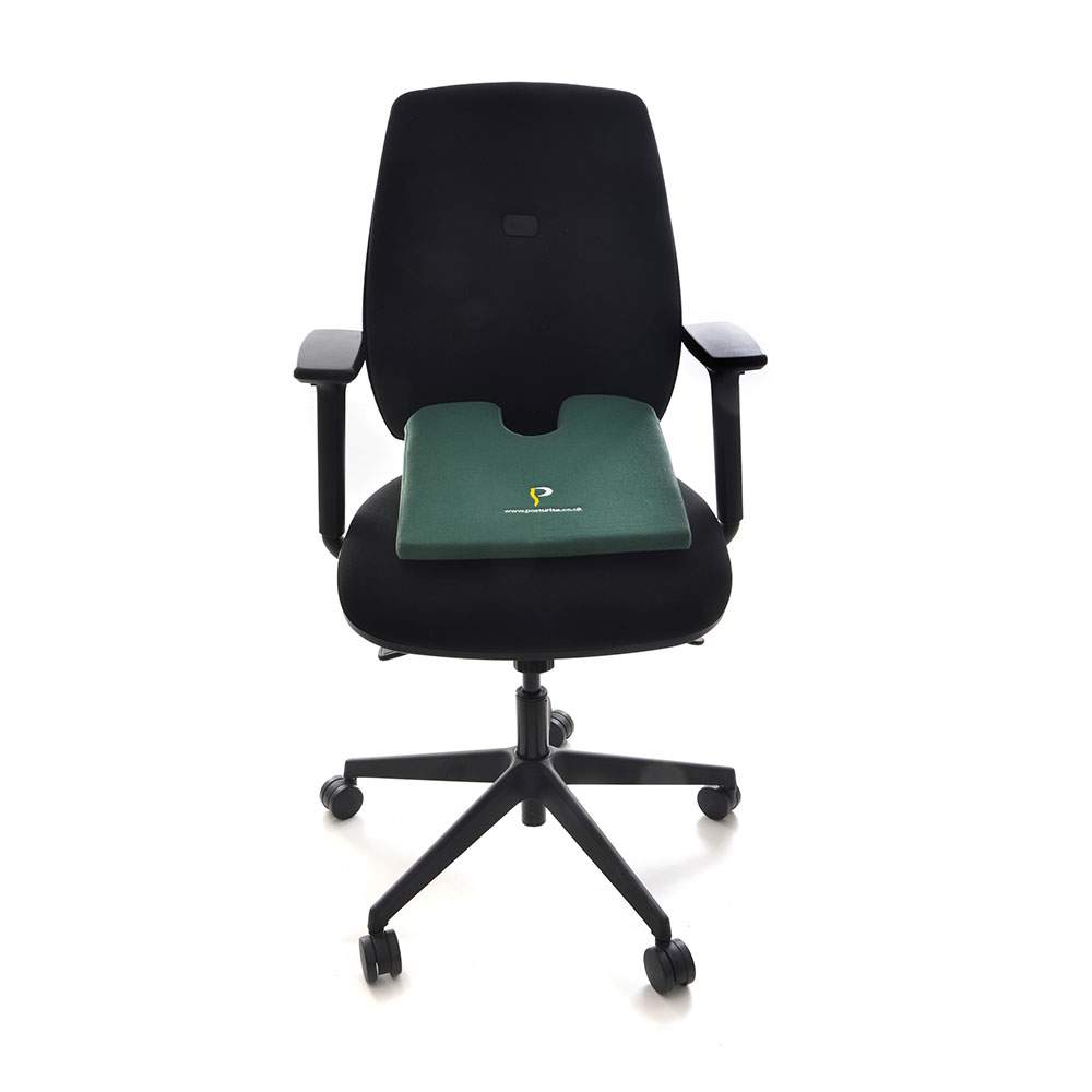Posturite Coccyx Cut-out Wedge - shown on an ergonomic chair