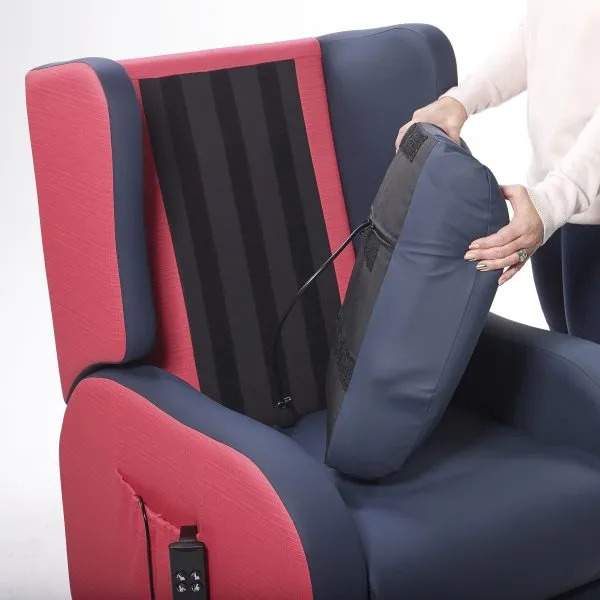 Person removing back rest.