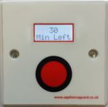 Ovenguard switch box with LCD display and red button in centre.