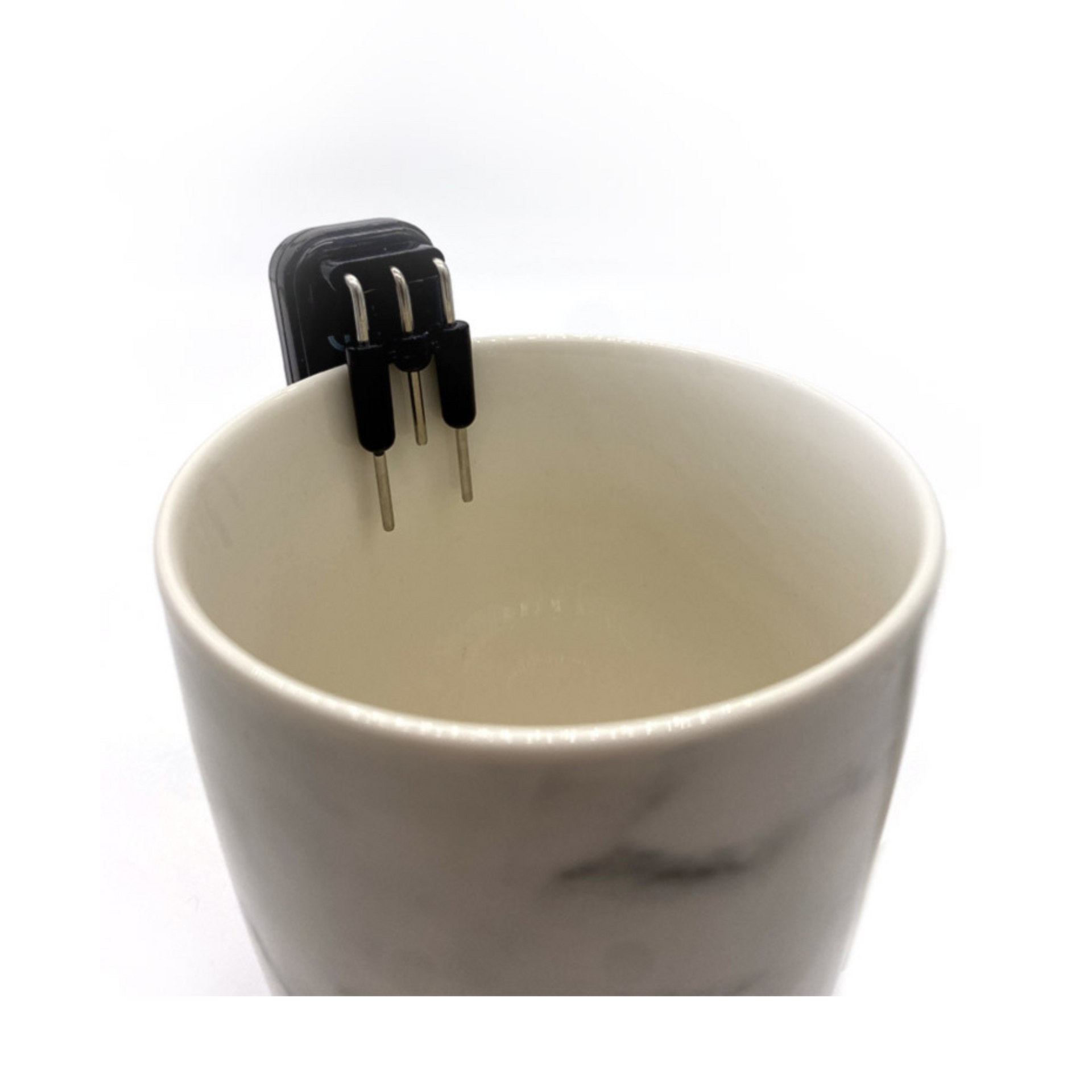 Birds eye view of the Liquid Level Indicator  on the lip of a cup