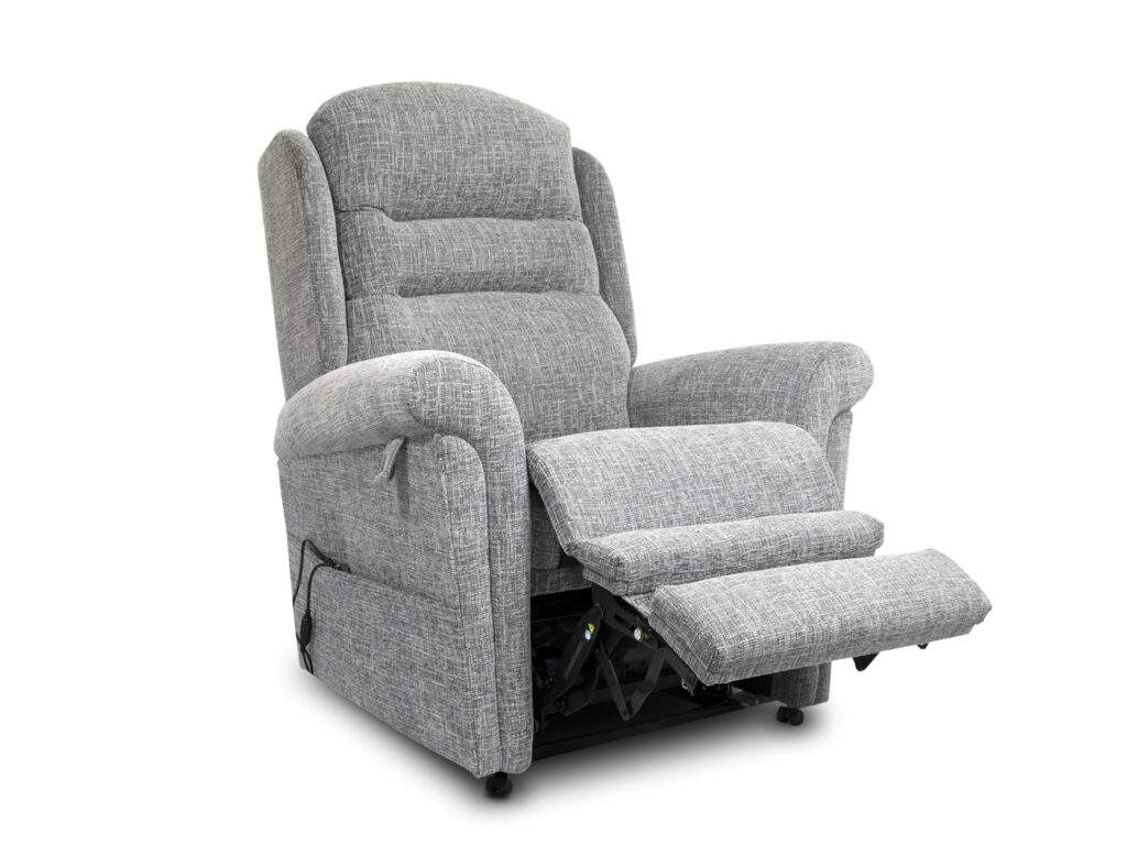 Grey Buxton chair side view with foot rest out and reclined.
