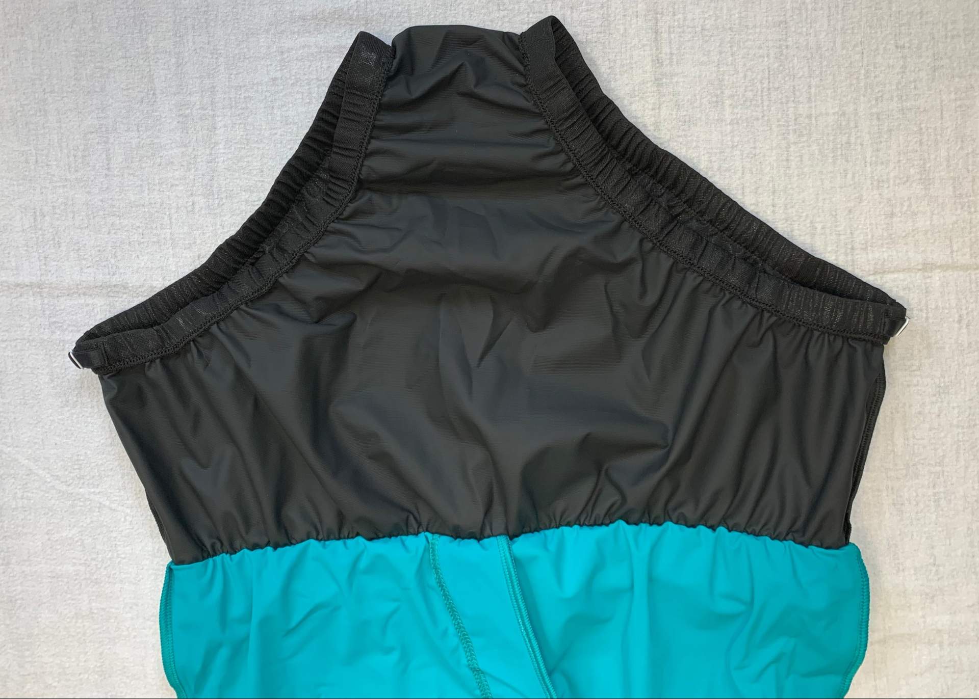 Inside out of product shown on turquoise 